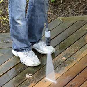 Man,Using,Power,Washer